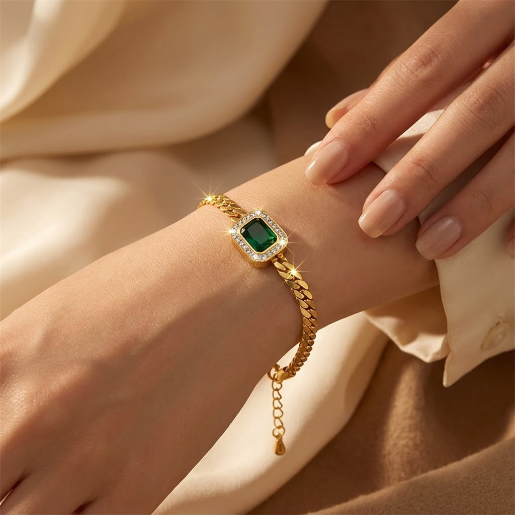 Bracelet chaîne en or à émeraude