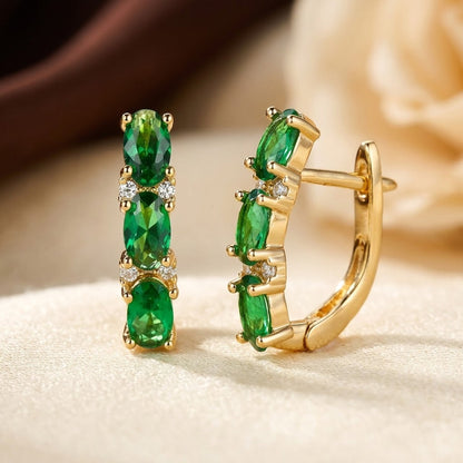 Créoles verticales en or à émeraude