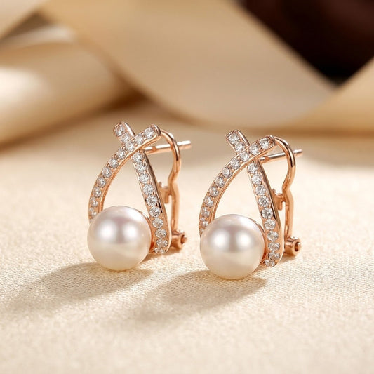 Puces d'oreilles perle entrecroisées en or