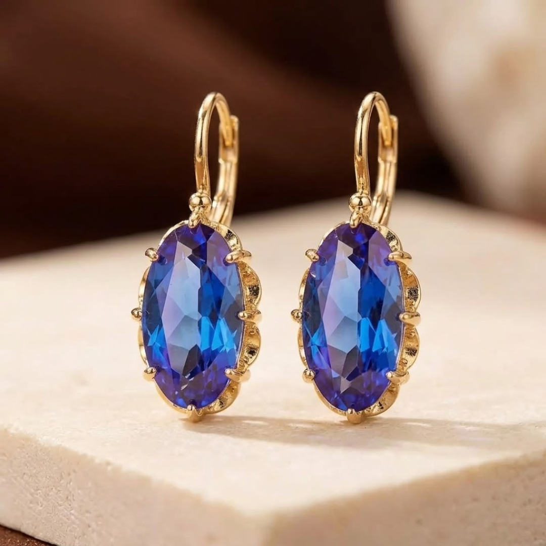 Boucles d'oreilles pendantes en or à saphir