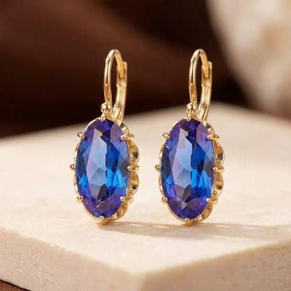 Boucles d'oreilles pendantes en or à saphir