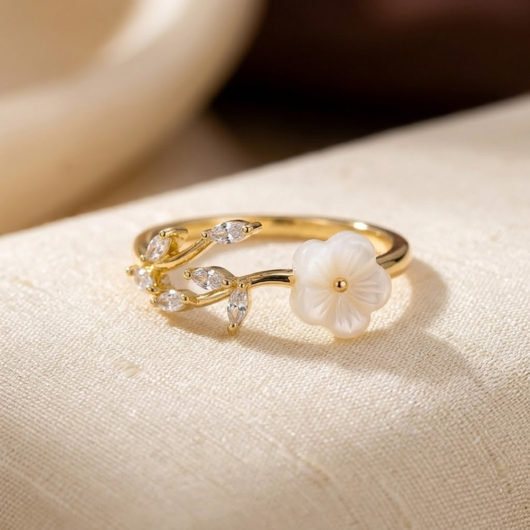 Bague ouverte fleur et feuille en or