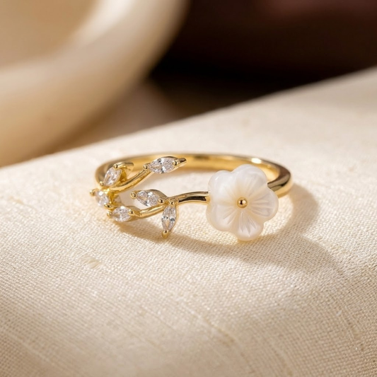 Bague ouverte fleur et feuille en or