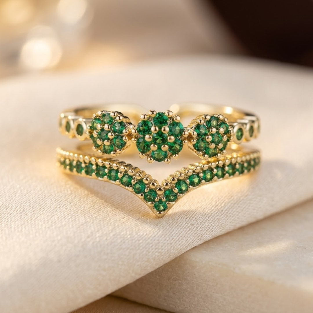 Bague cluster en or à émeraude