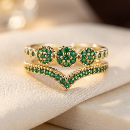 Bague cluster en or à émeraude
