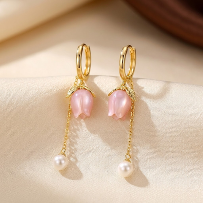 Boucles d'oreilles pendantes florales à perle en or