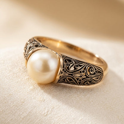 Bague filigrane à perle en or