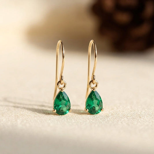 Boucles d'oreilles pendantes goutte en or à émeraude