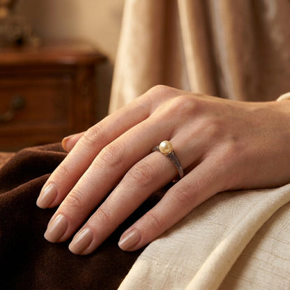 Bague filigrane à perle en or