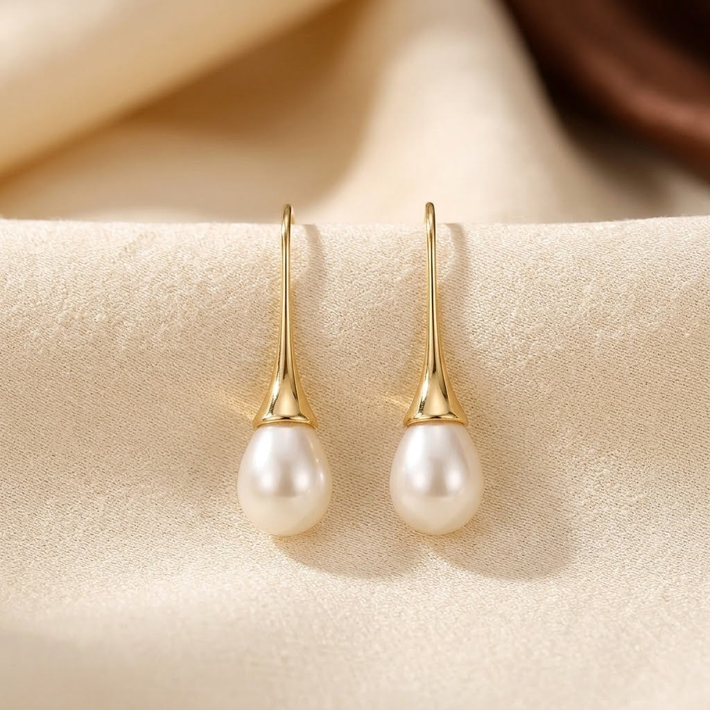 Boucles d'oreilles pendantes perle en or