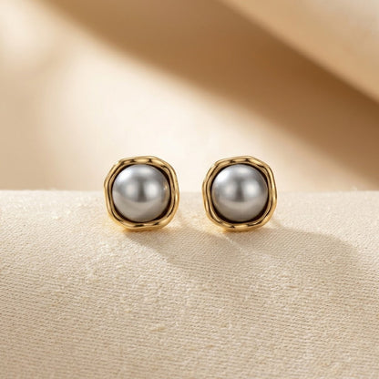 Puces d'oreilles perle en or