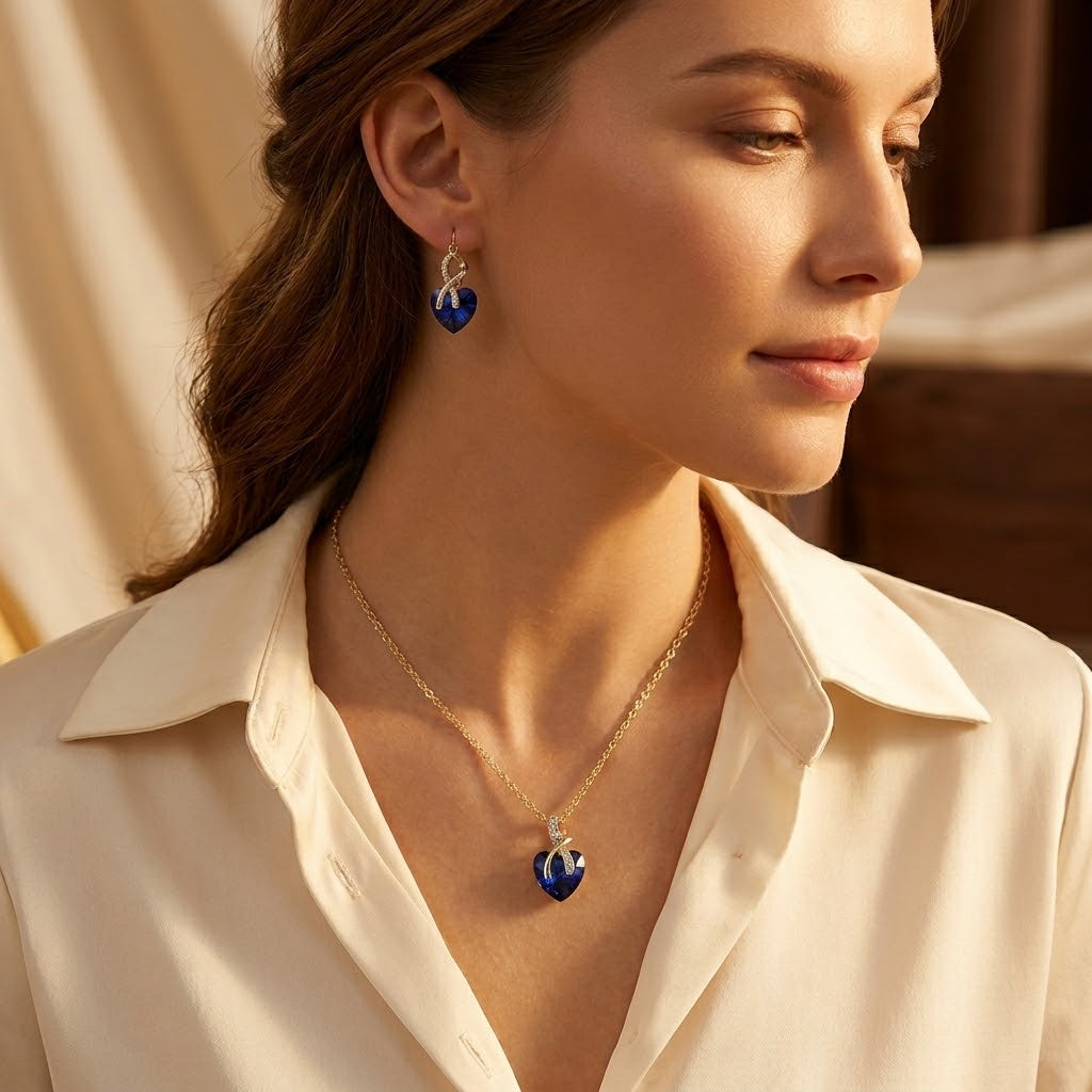 Parure collier et boucles d'oreilles cœur en or à saphir