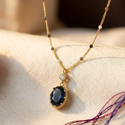 Collier goutte ovale en or à saphir