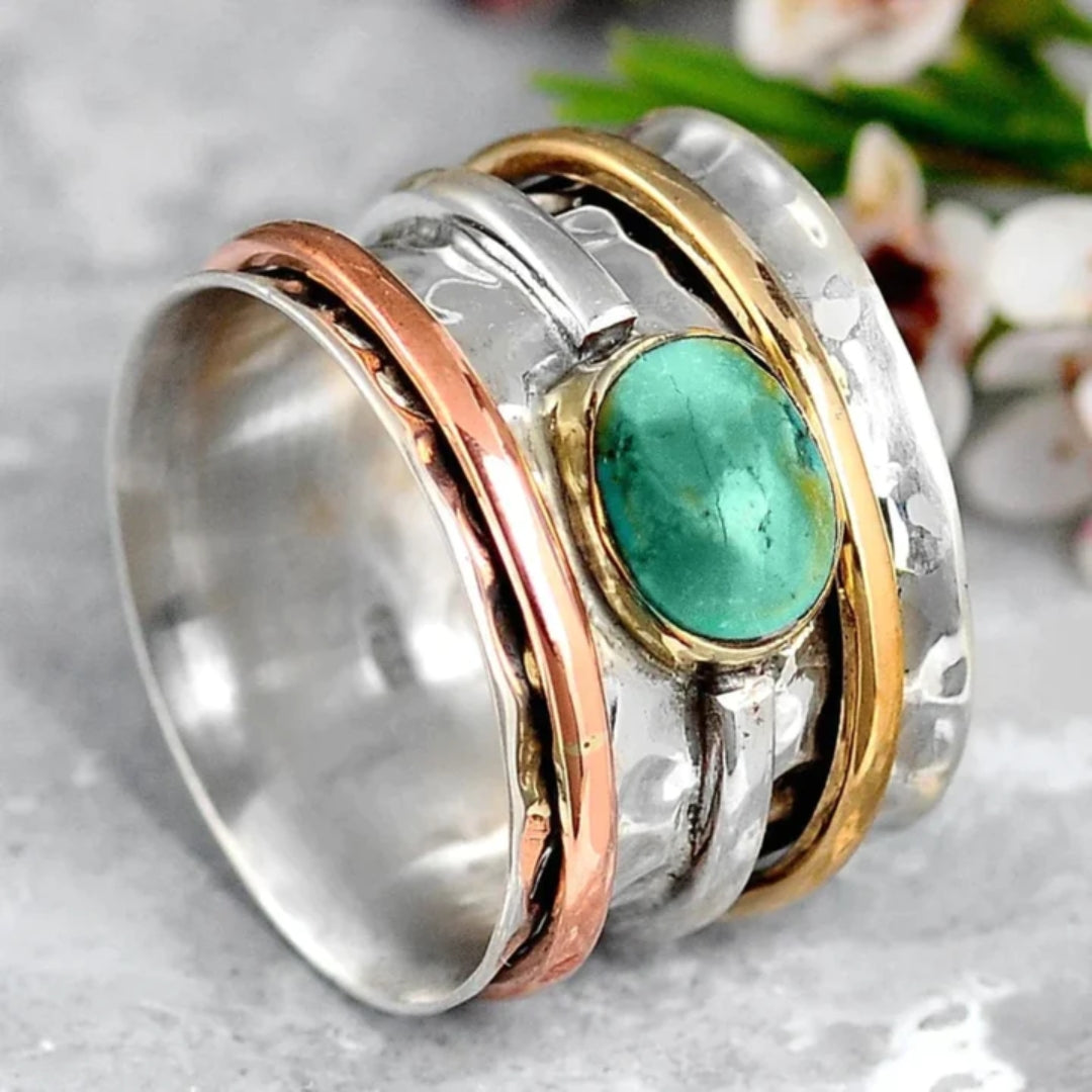 Bague serti clos en argent, or et or rose
