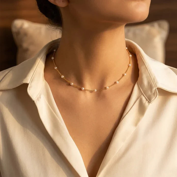 Collier chaîne perles espacées en or