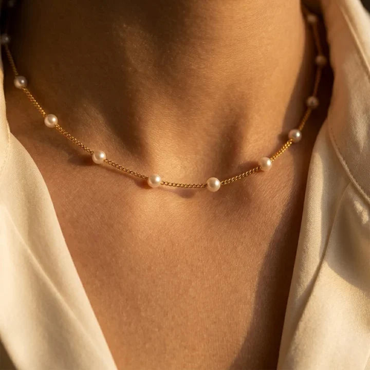 Collier chaîne perles espacées en or