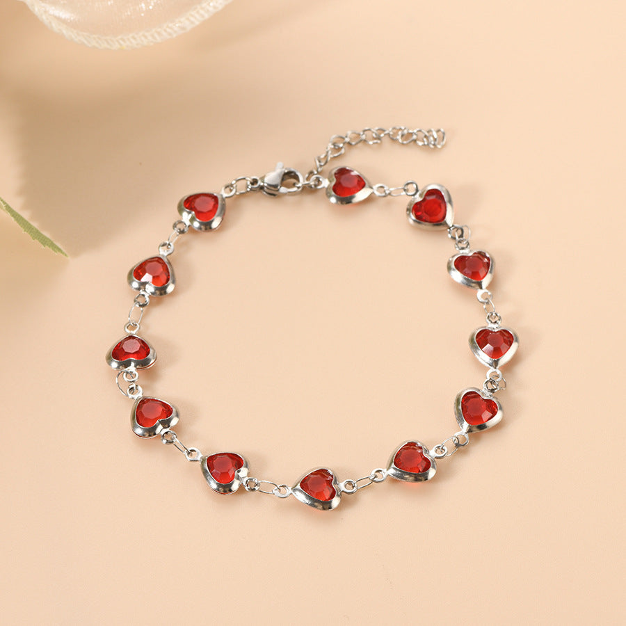 Bracelet chaîne cœur en argent à rubis
