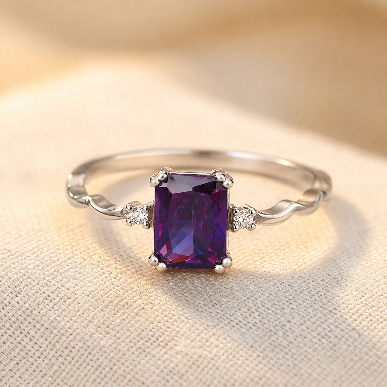 Bague taille émeraude en argent à améthyste