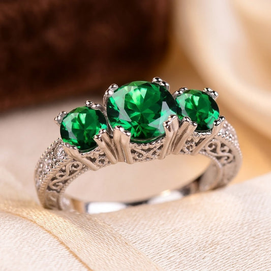 Bague trois pierres en argent à émeraude