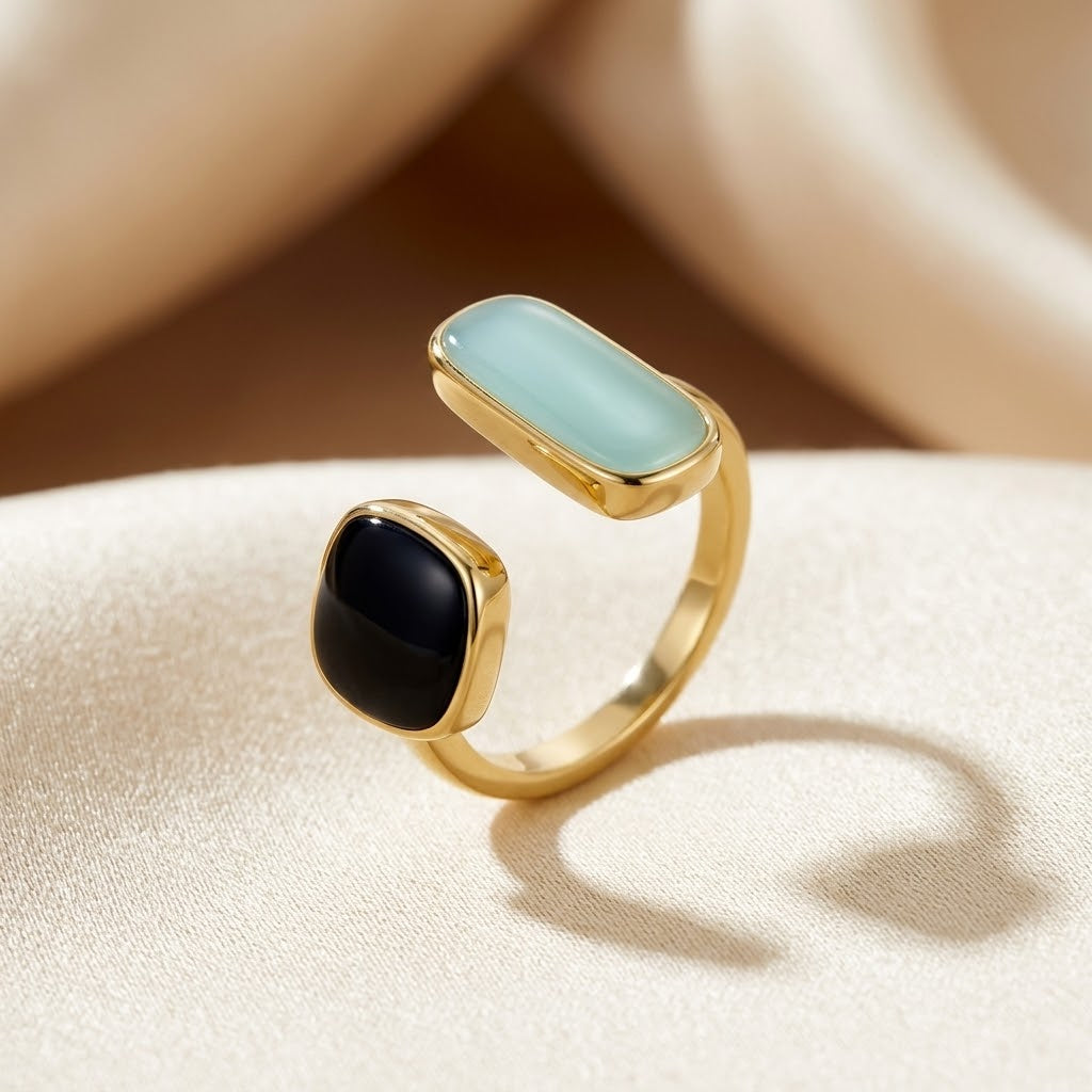 Bague ouverte deux pierres en or