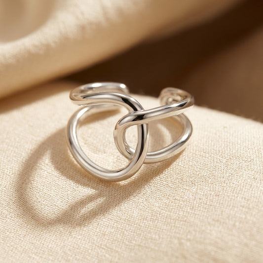Bague ouverte entrelacée en argent