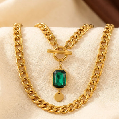 Collier chaîne en or à émeraude