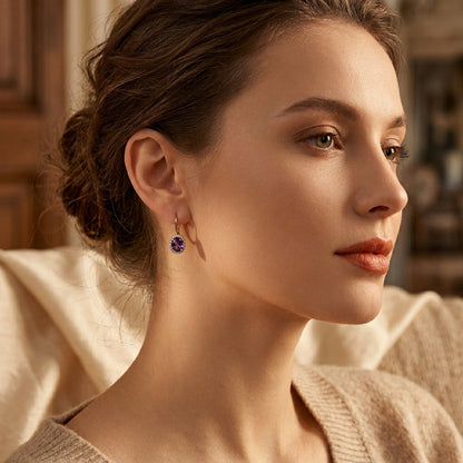 Boucles d'oreilles couronne en or à améthyste