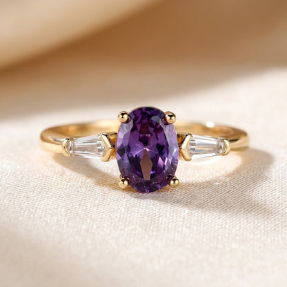 Bague trois pierres en or à améthyste
