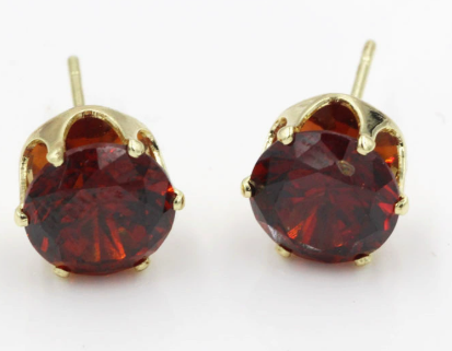 Puces d'oreilles rondes au rubis