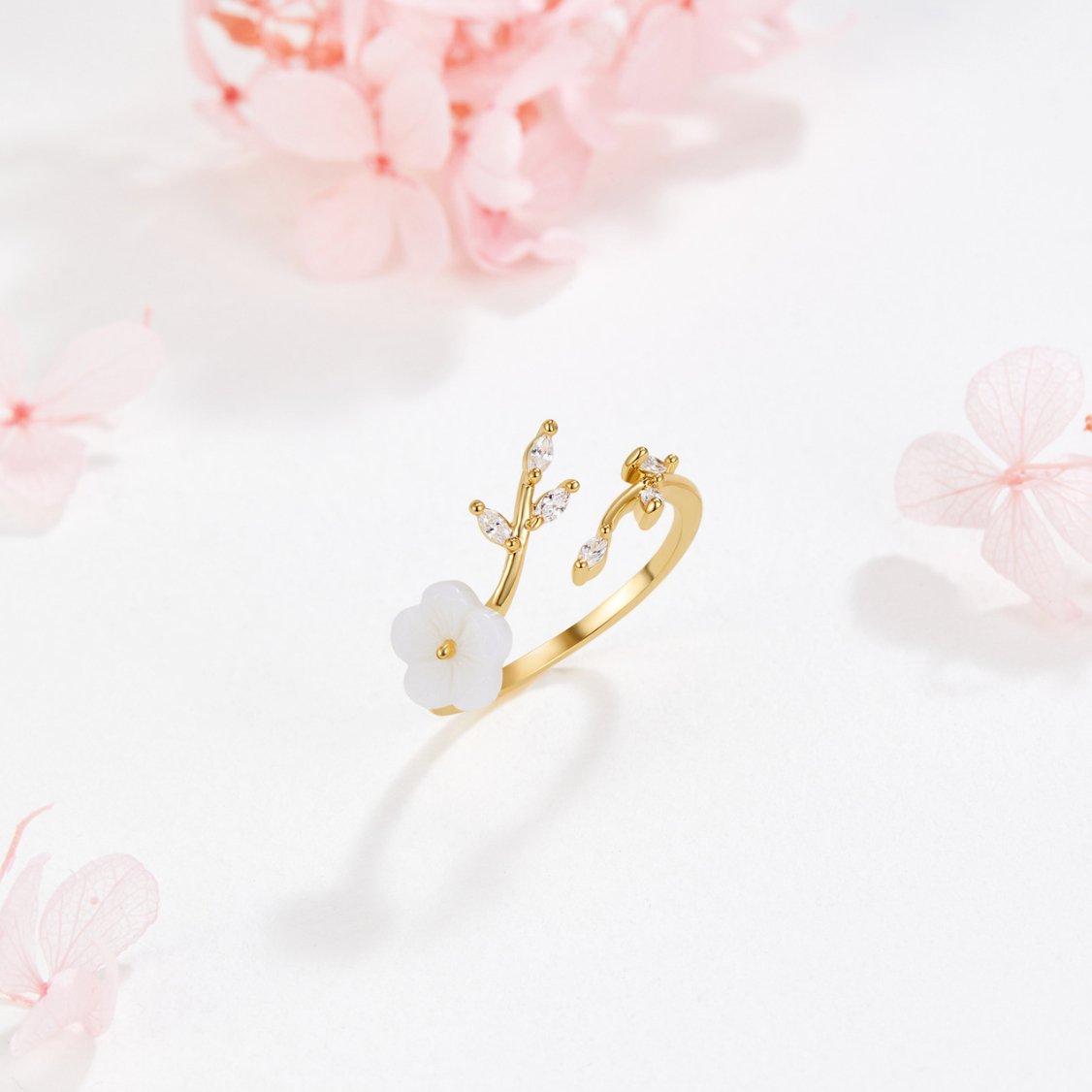 Bague ouverte fleur et feuille en or