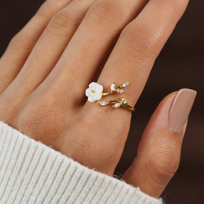 Bague ouverte fleur et feuille en or